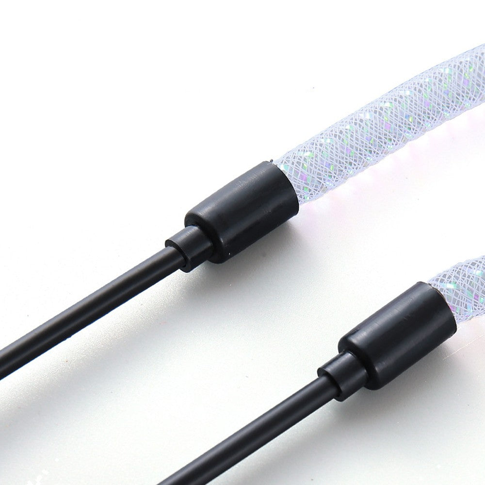 Black sticks with the mesh tube attached