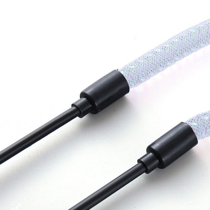 Black sticks with the mesh tube attached