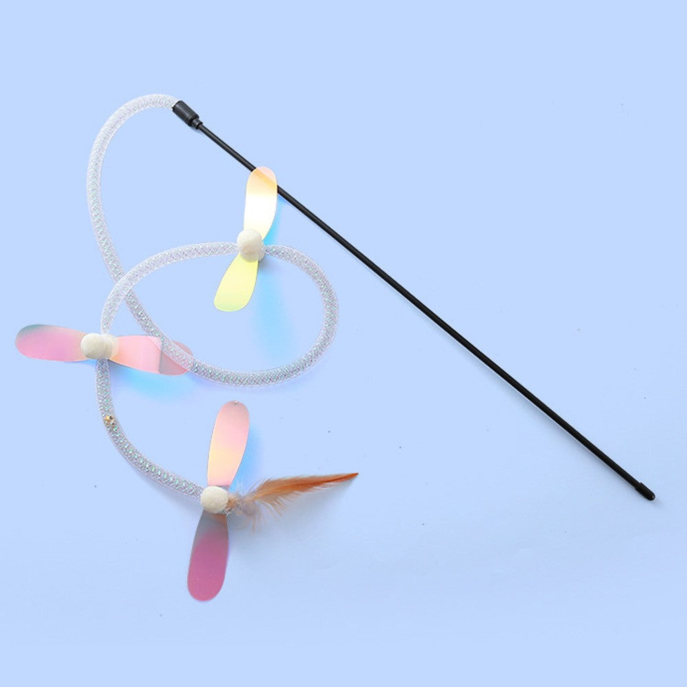 Dragonfly cat toy wand on a blue background