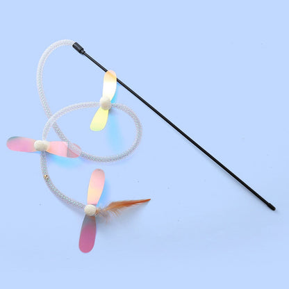 Dragonfly cat toy wand on a blue background