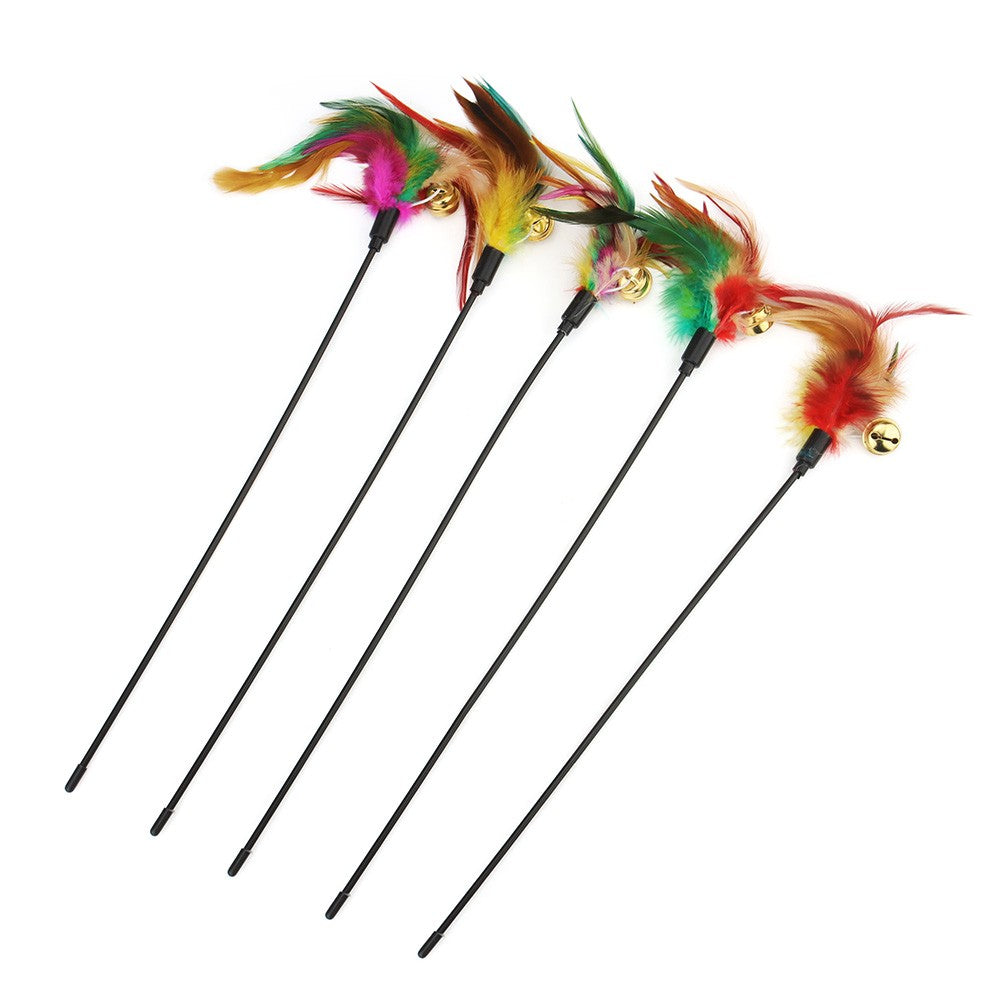 Five feather cat wands laid out with bright feathers