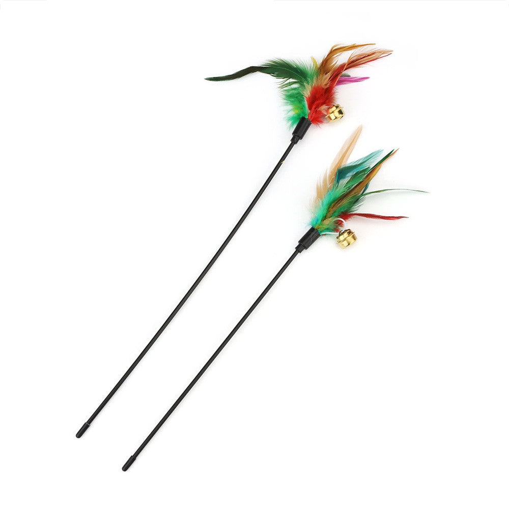 Two feather cat wands with bells side by side