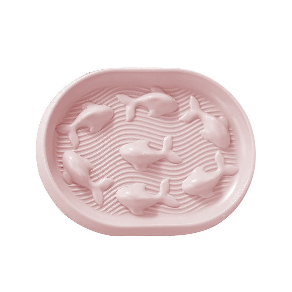 Pink oval slow feeder cat bowl with raised fish shapes
