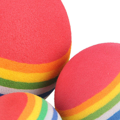 Close-up of the soft EVA foam texture of the rainbow cat balls