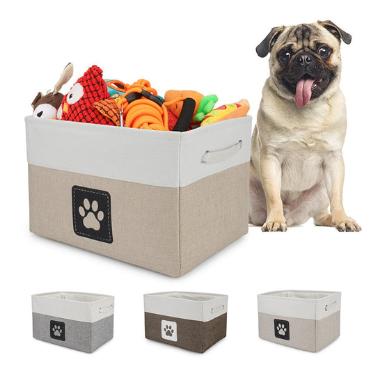 Pug sitting next to a foldable dog toy basket filled with toys
