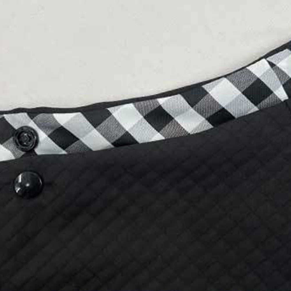 Close-up of the gingham trim and button closure