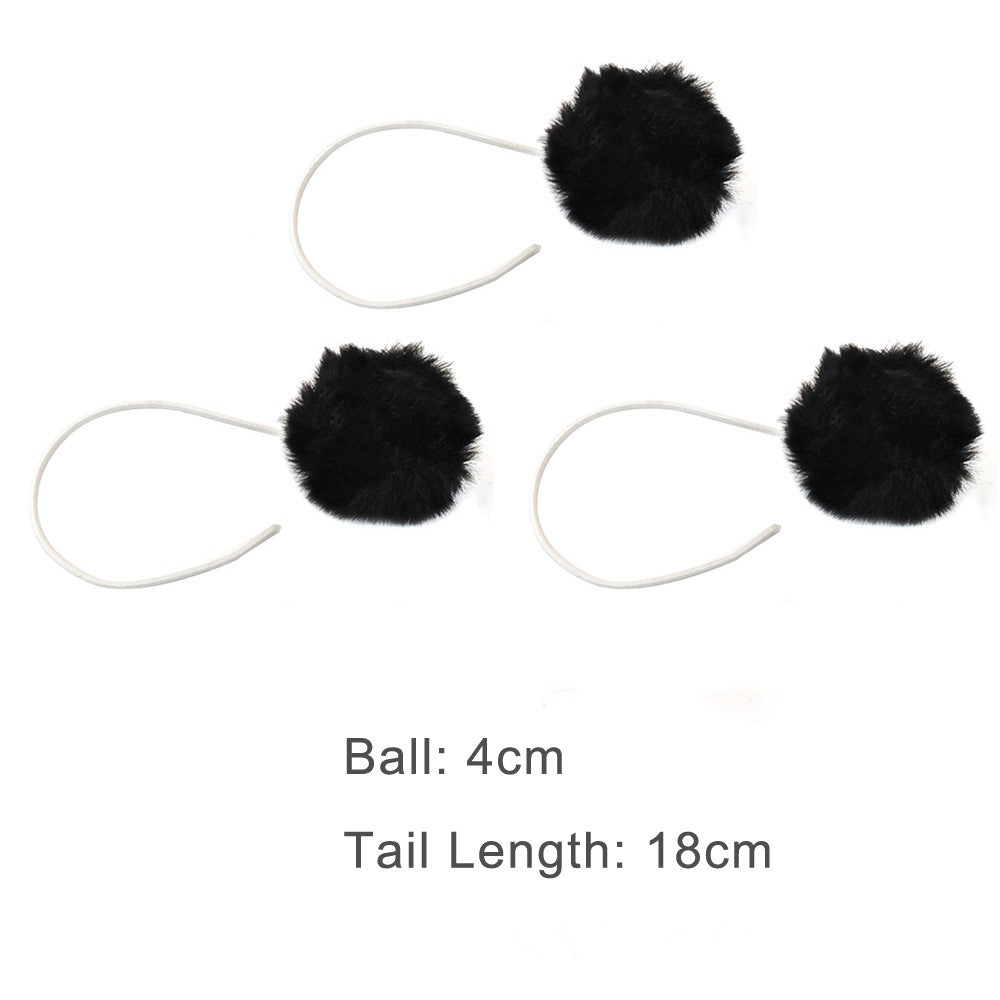 Three black fluffy pom-pom hanging toys