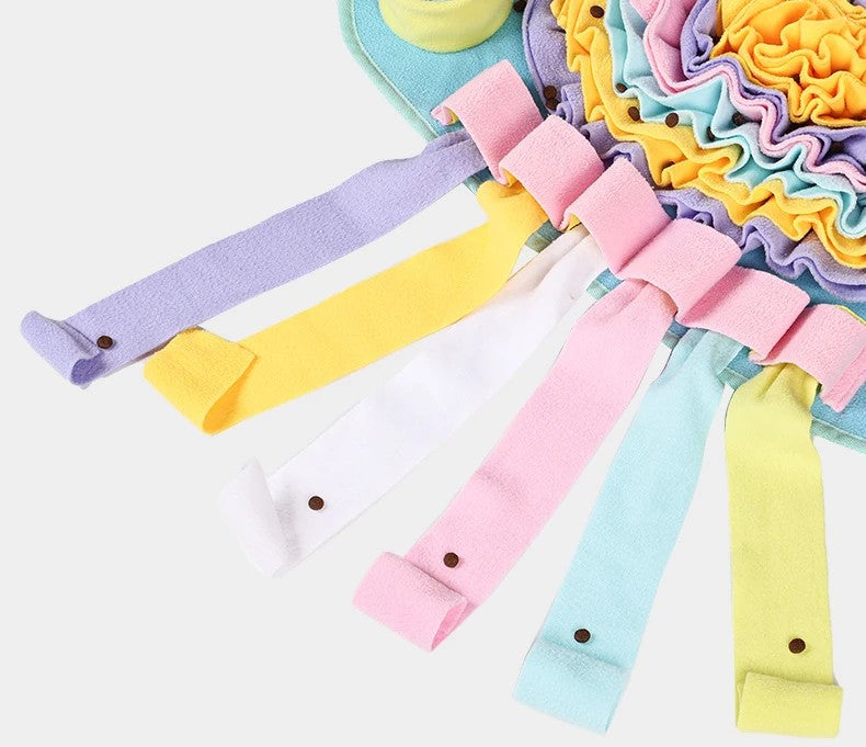 Fleece tentacle strips with snap buttons on the jellyfish snuffle mat