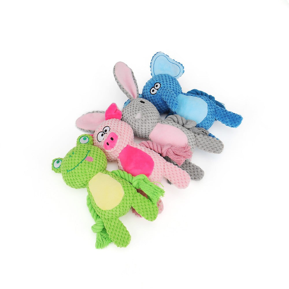 Pile of knotted plush dog toys: frog, pig, bunny and elephant