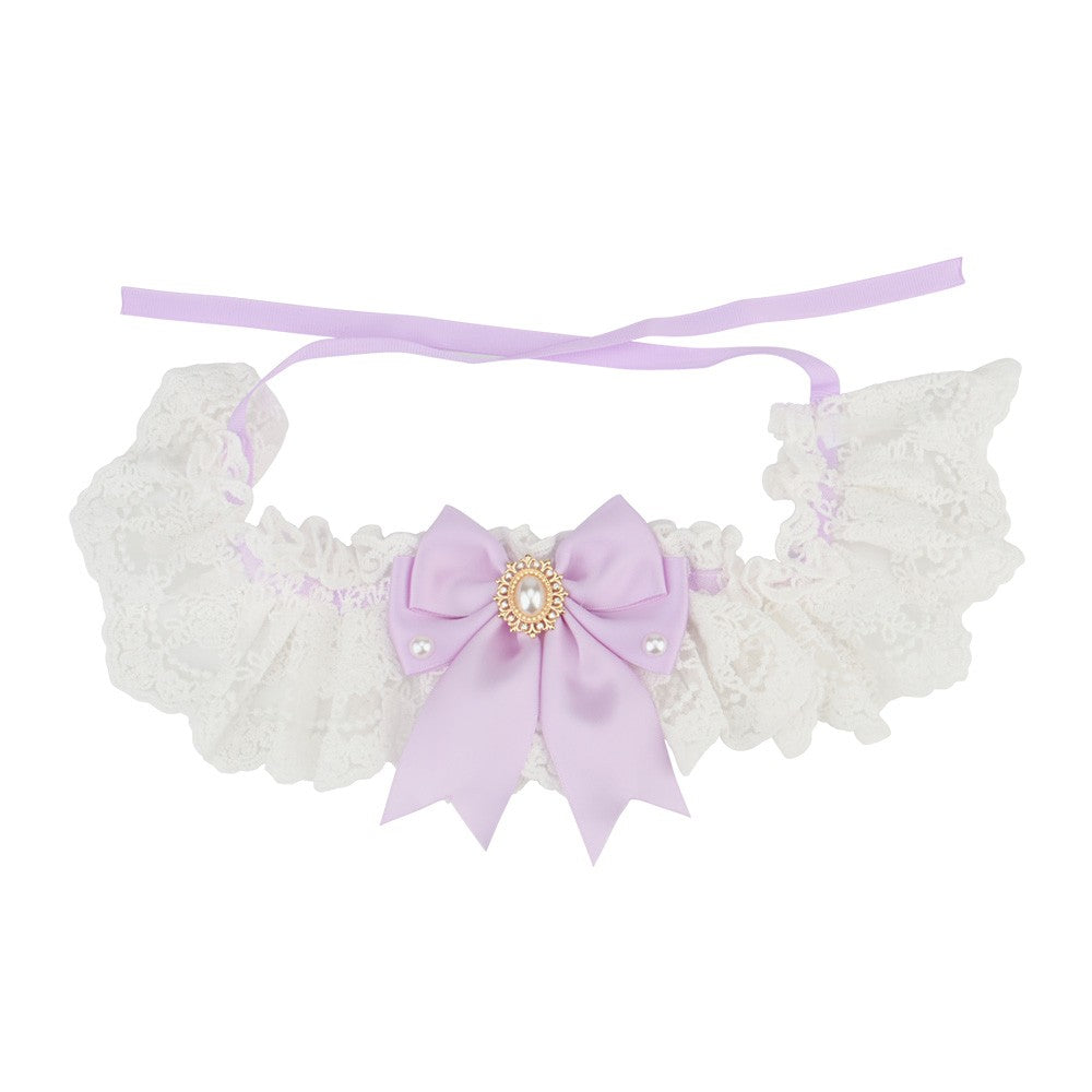 Lilac satin bow on a white lace bow cat collar with ribbon ties