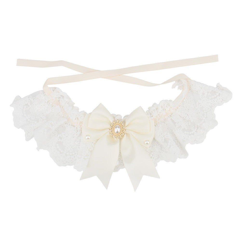Ivory satin bow on a white lace bow cat collar with cream ribbon
