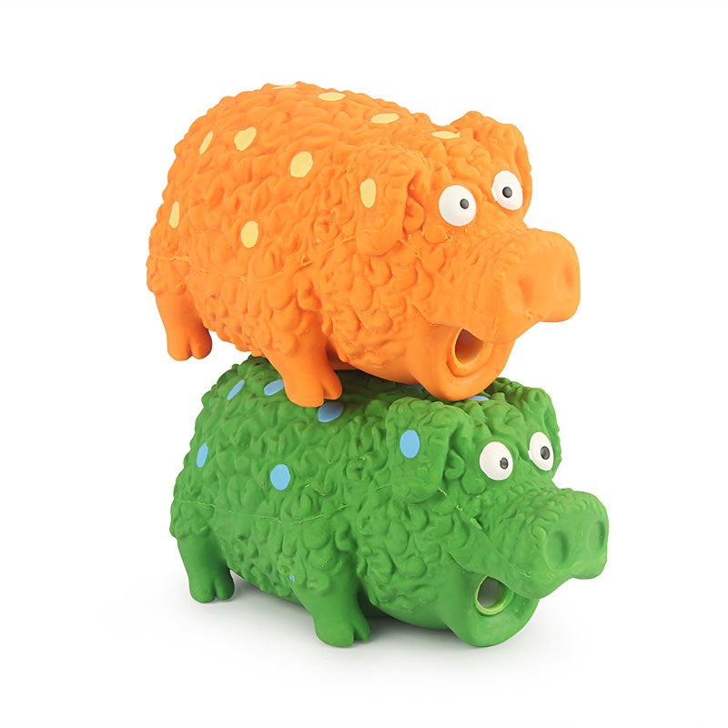 Orange and green latex pig dog toys with polka dots