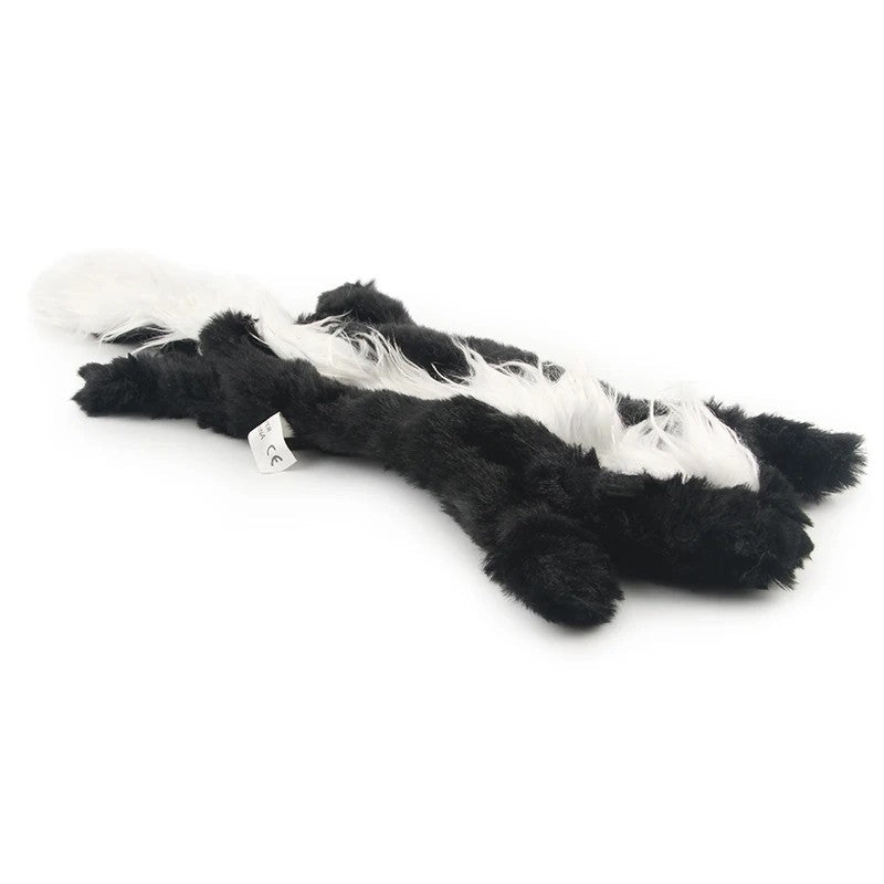 Black and white skunk plush dog toy