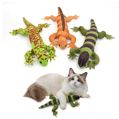 Three plush lizard cat toys in green, orange and dark green with a cat