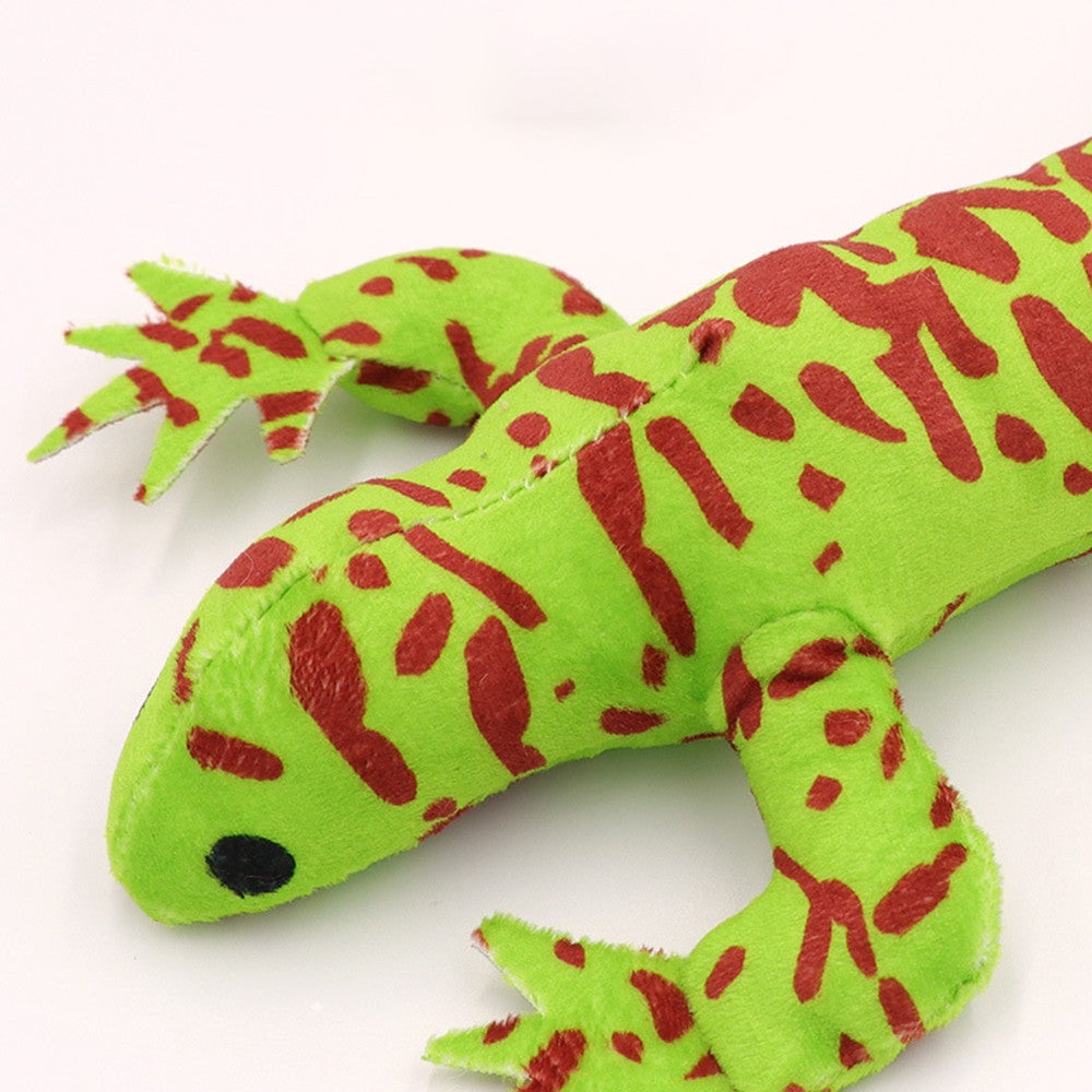 Close-up of the printed plush on the lime green lizard