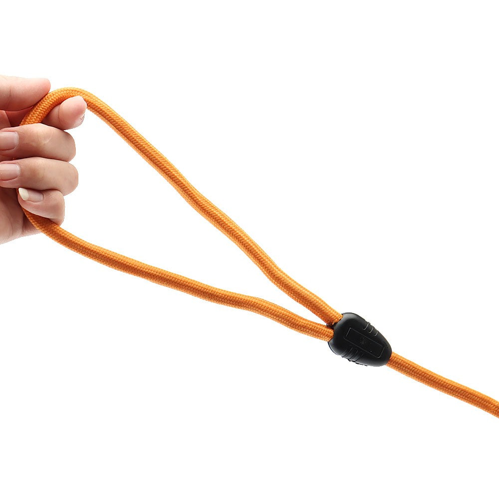 Hand holding the rope loop handle of the orange long line