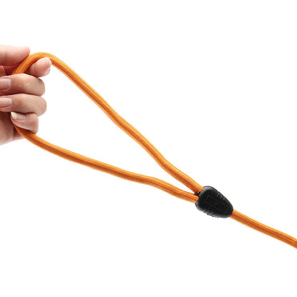 Hand holding the rope loop handle of the orange long line