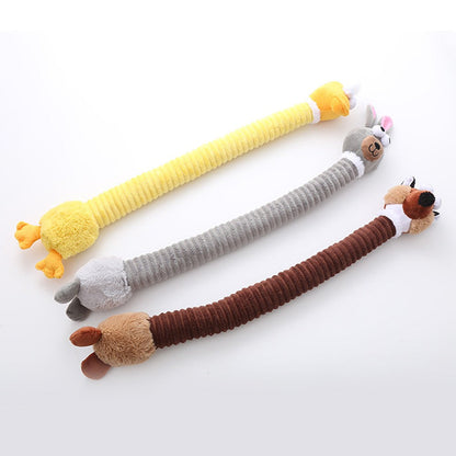 Three long neck dog toys: yellow duck, gray bunny and brown platypus