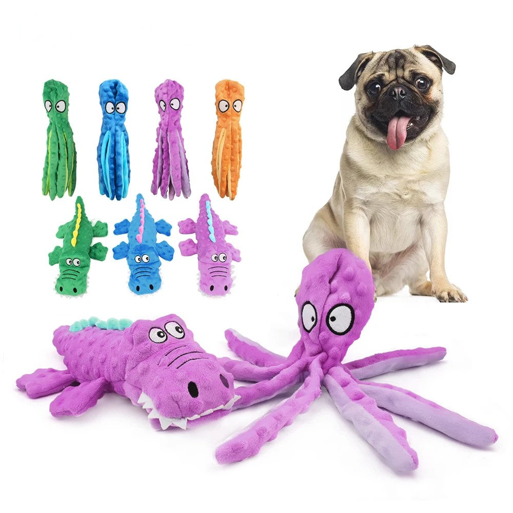 Pug with octopus and crocodile dog toys