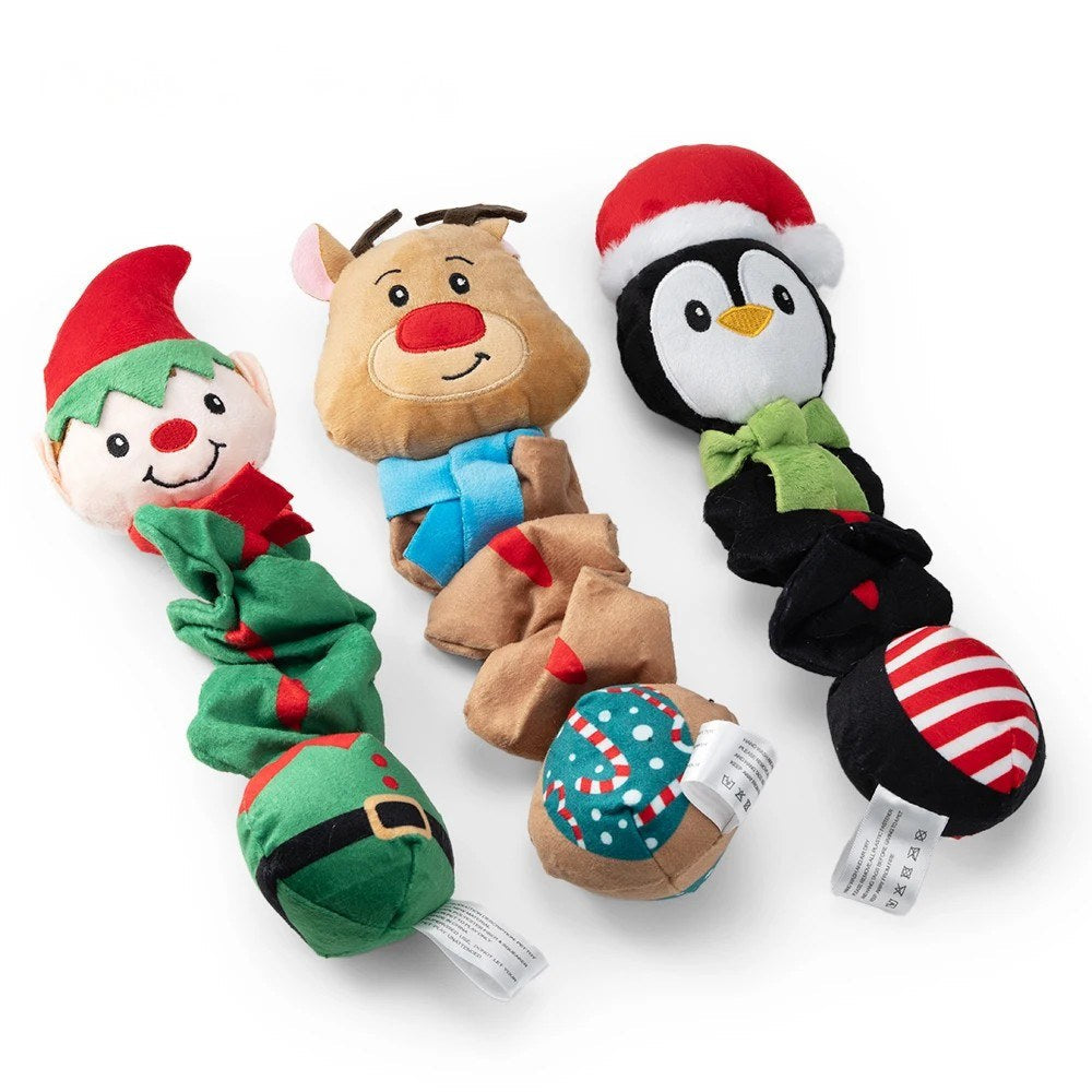 Penguin dog toy in black with elf and reindeer versions, side by side