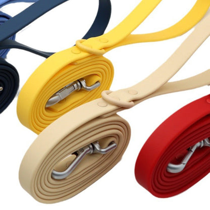 Coiled PVC leashes in yellow, beige and red