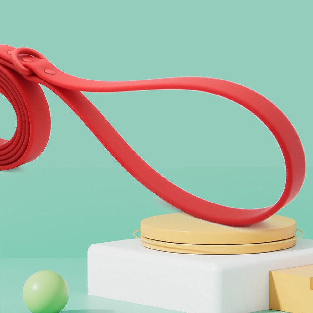 Red PVC dog leash looped over a stand