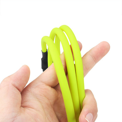 Hand holding the coiled neon yellow line