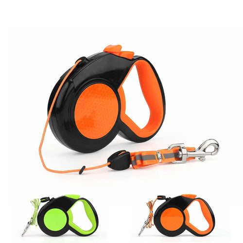 Retractable dog leash in orange, side view with reflective strap and clip