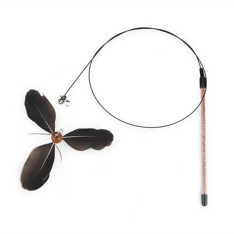 Rotating feather cat toy with a gray feather head on a steel wire wand