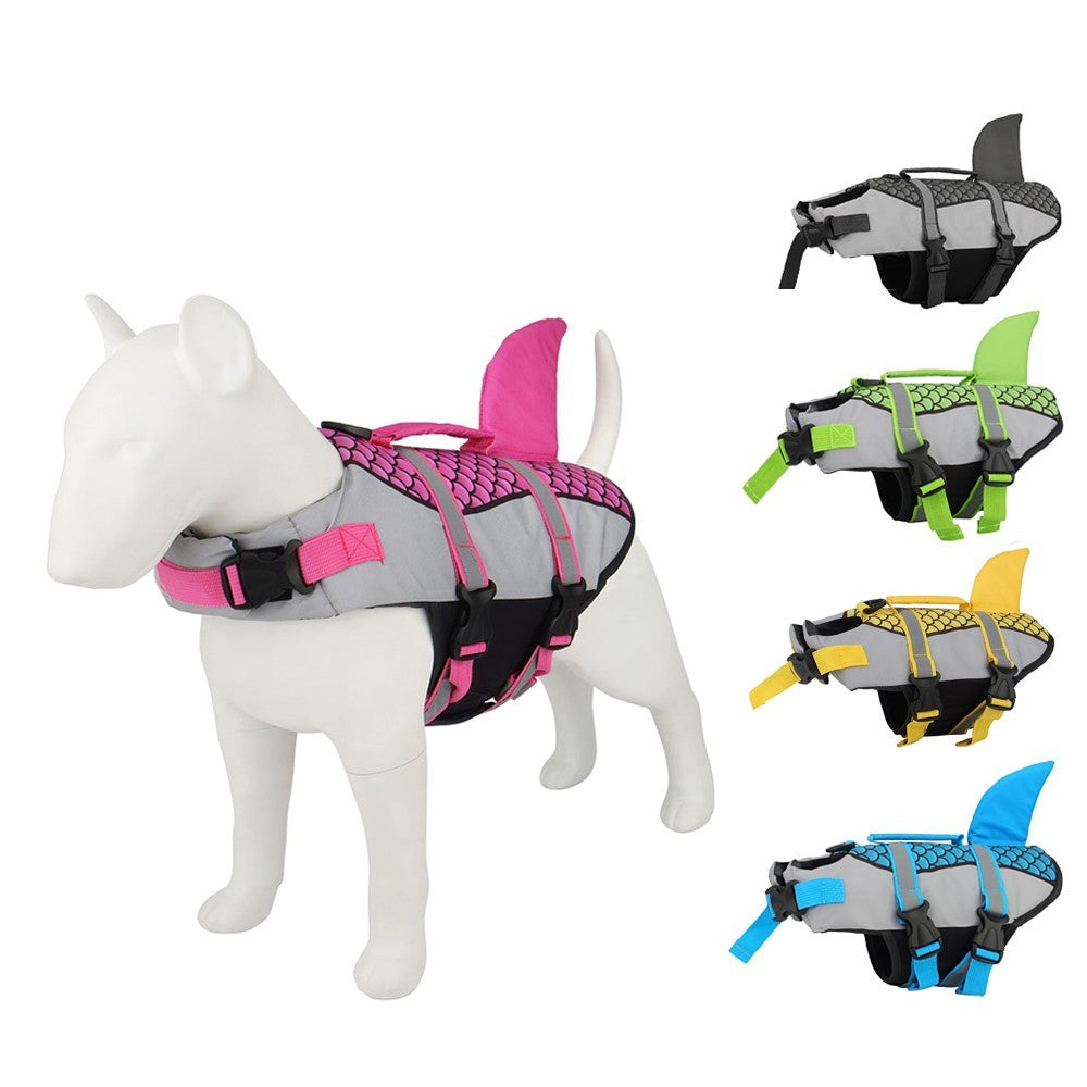 Pink scales shark dog life jacket on a dog mannequin with the four other colours