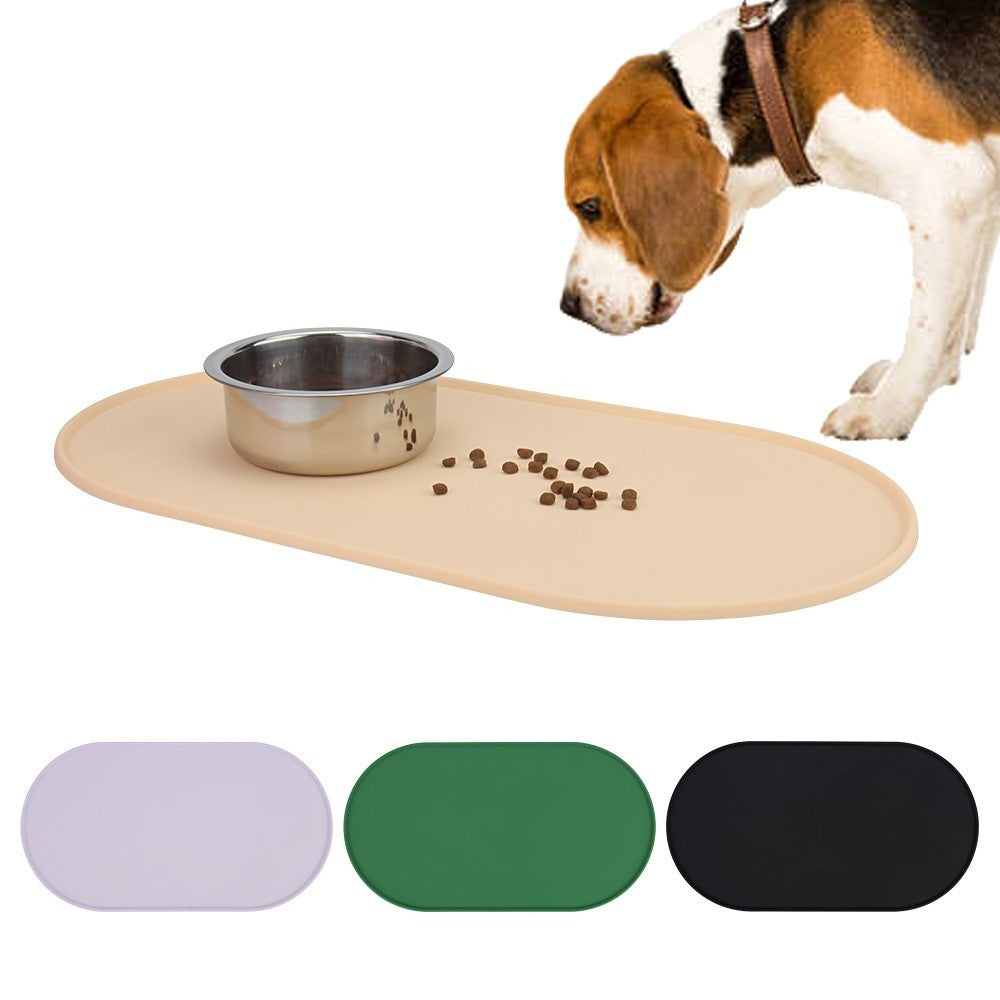 Beagle eating from a bowl on the beige silicone dog bowl mat