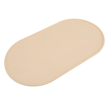 Beige oval silicone dog bowl mat