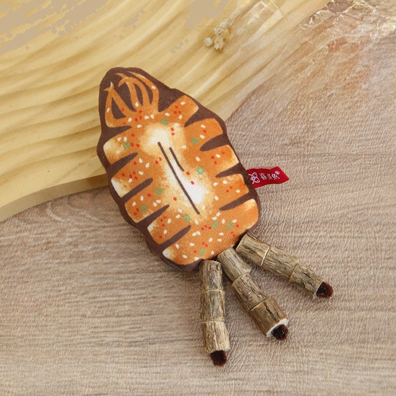Squid-shaped cat chew toy with four silvervine stick legs