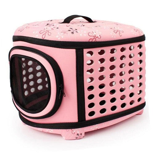 Size L pet carrier in pink floral with air holes all round