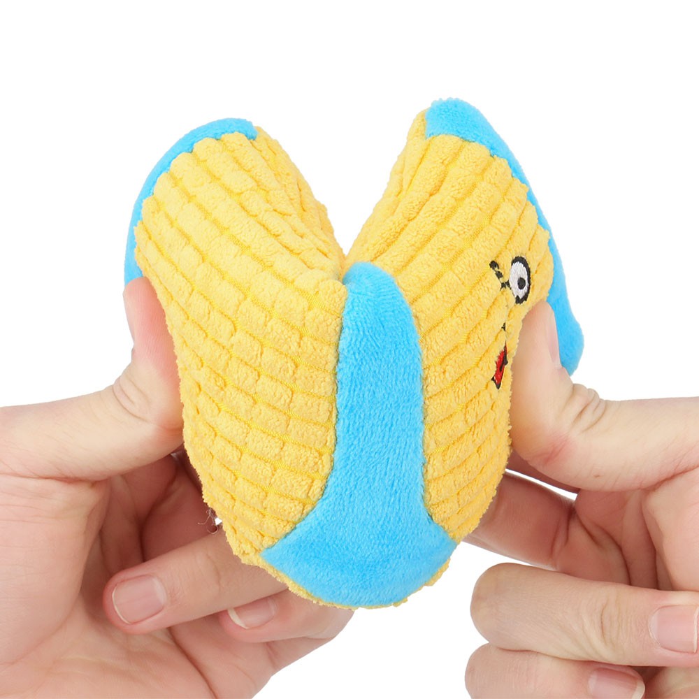Hands squeezing the soft ribbed sock toy to show how squishy it is