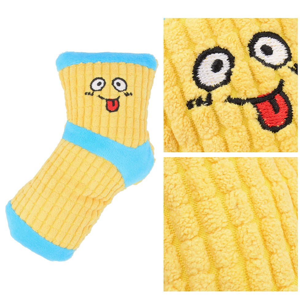 Close-up of the embroidered face and ribbed fabric on the sock dog toy