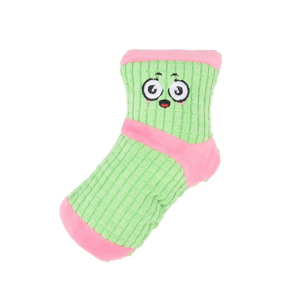 Green sock dog toy with a pink cuff and toe