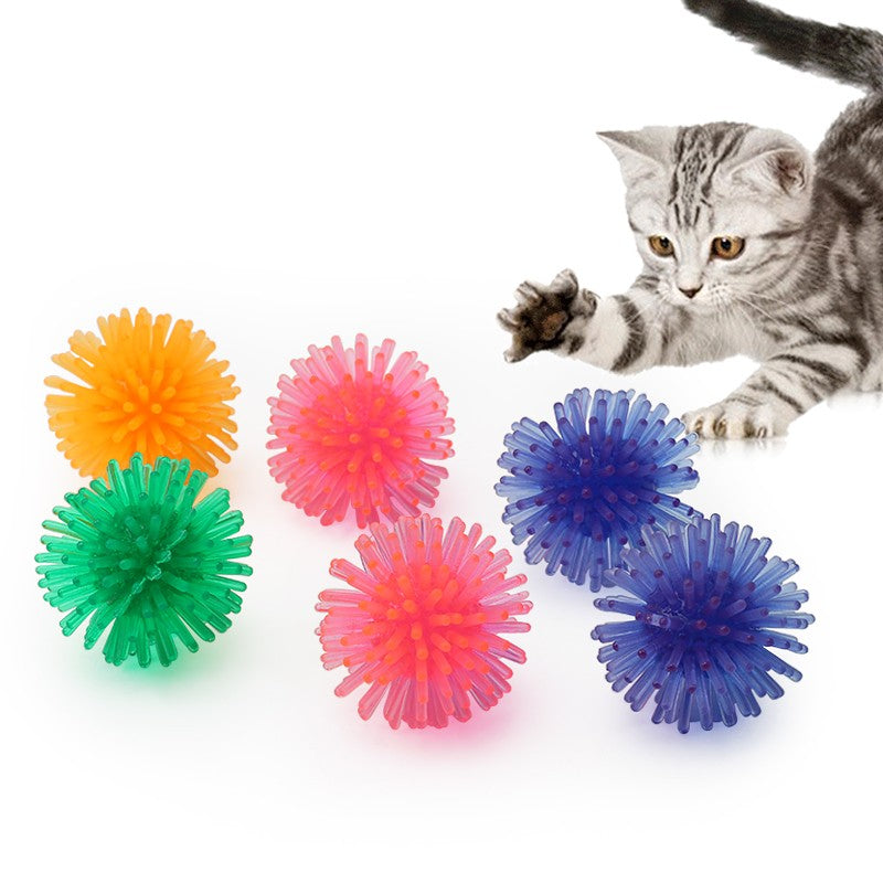 Spiky ball cat toys: soft PVC balls in bright colours with a kitten
