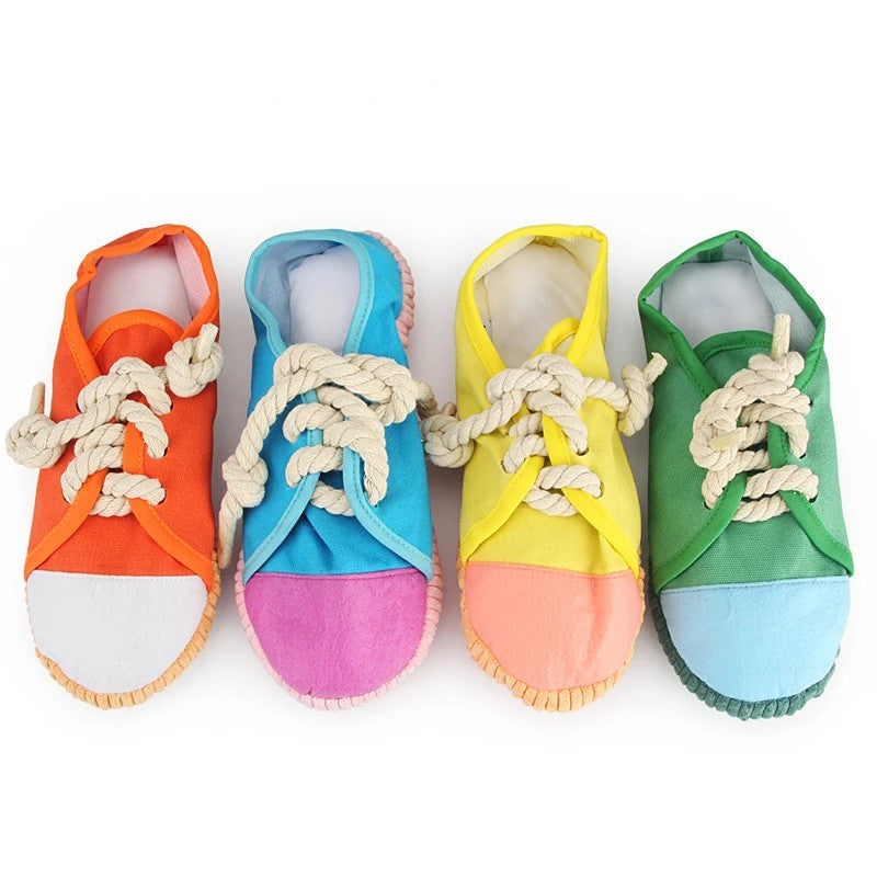 Squeaky toys for dogs: four plush sneaker toys in orange, blue, yellow and green