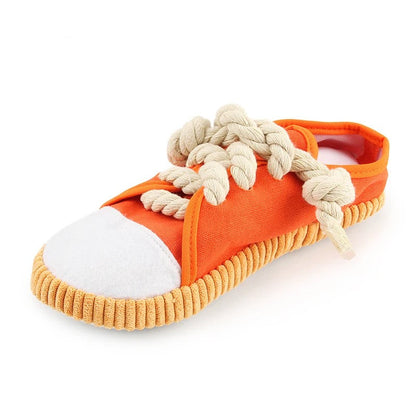 Orange sneaker squeaky dog toy with rope laces