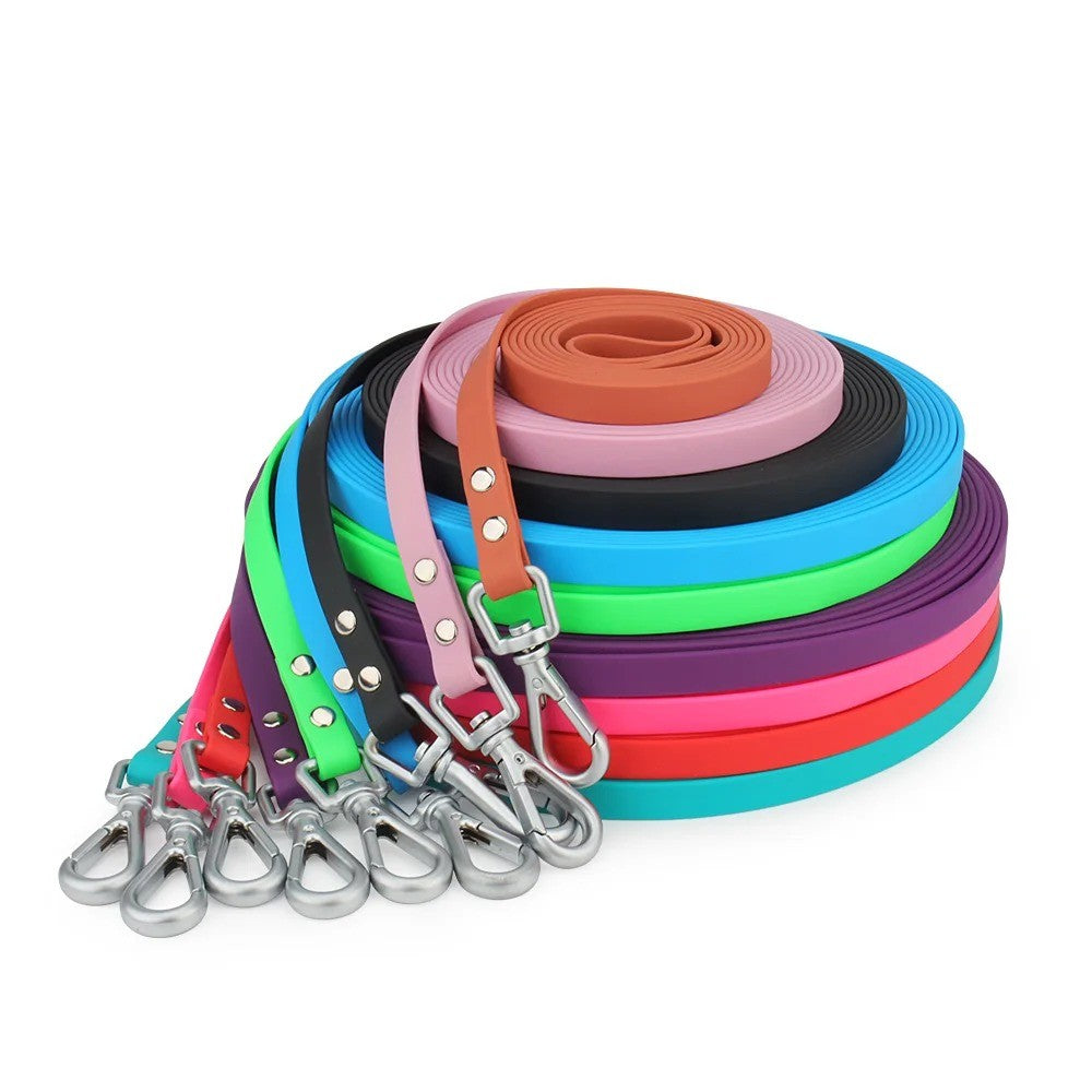 Tracking leads for dogs coiled in bright colours