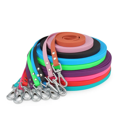 Tracking leads for dogs coiled in bright colours