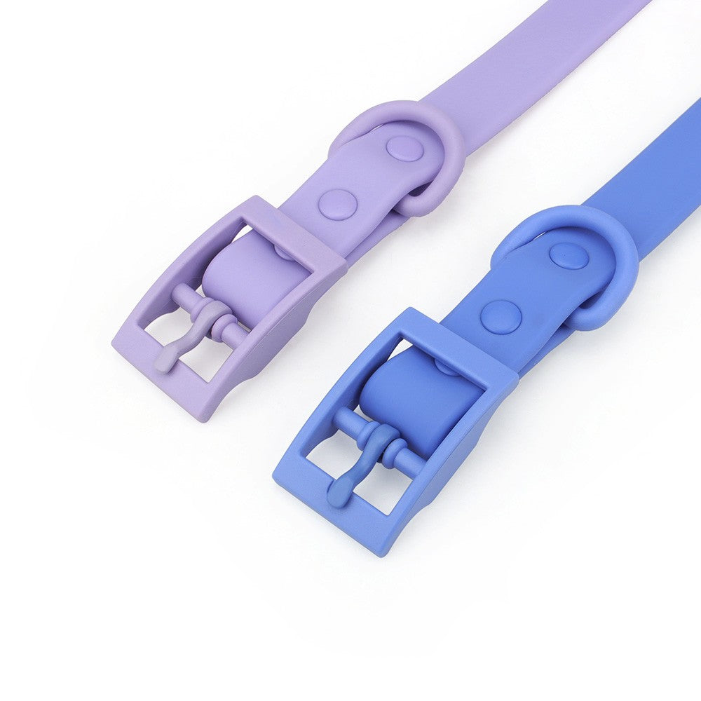 Close-up of the colour-matched pin buckles on lilac and blue collars