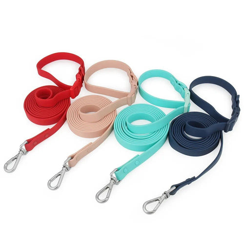 Waterproof hands-free dog leashes in red, blush, mint and navy